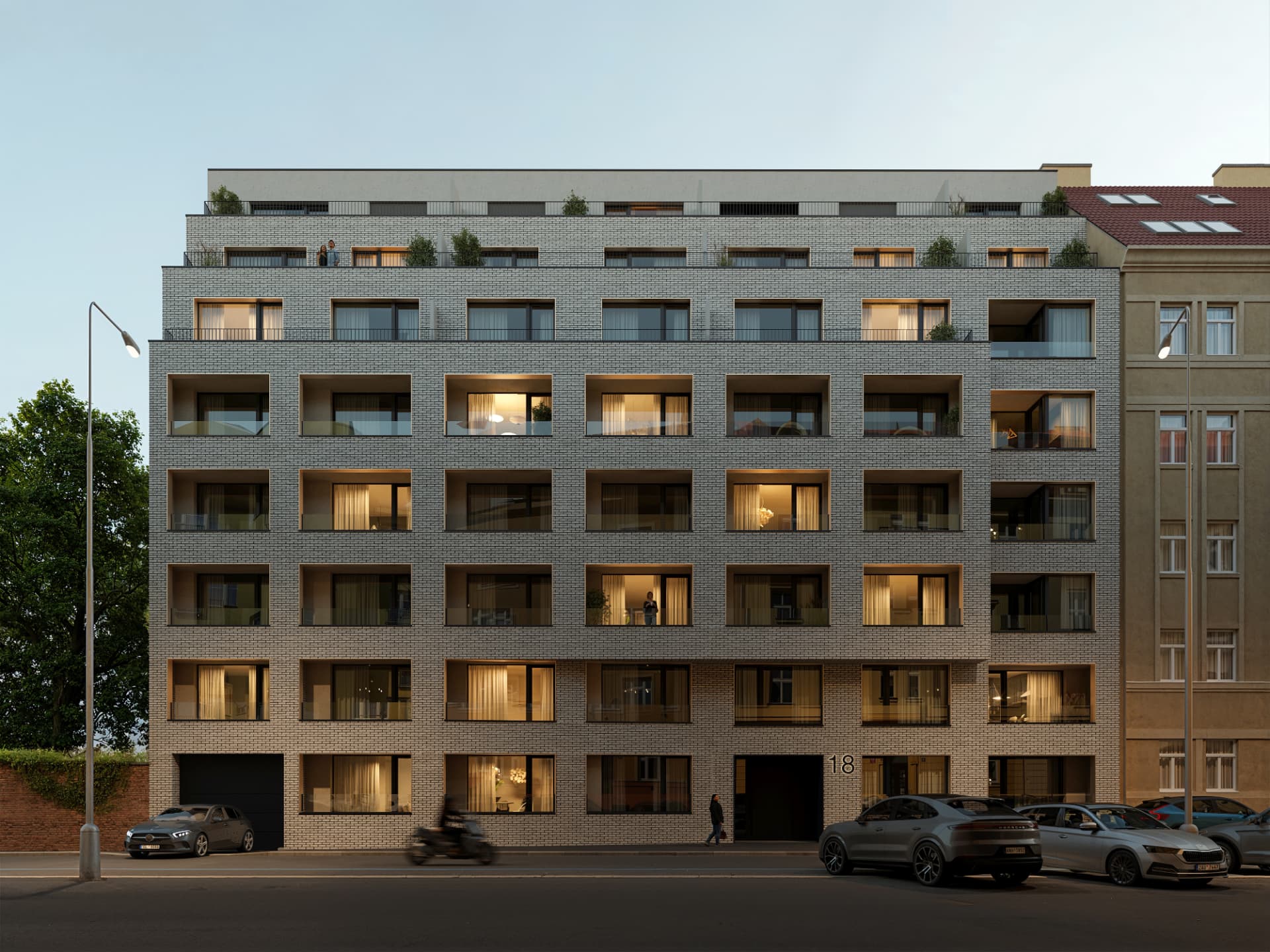 Osvětlená uliční fasáda domu Světova 18 večer